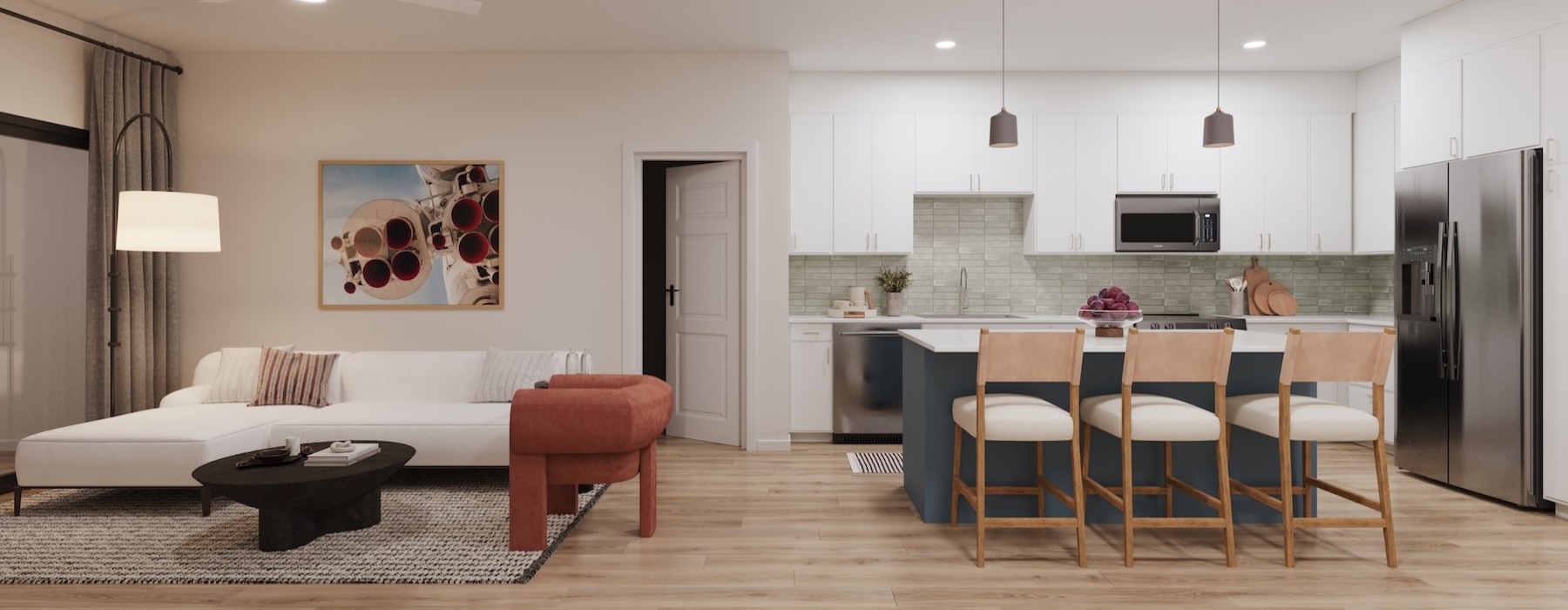 a kitchen with a couch and a table